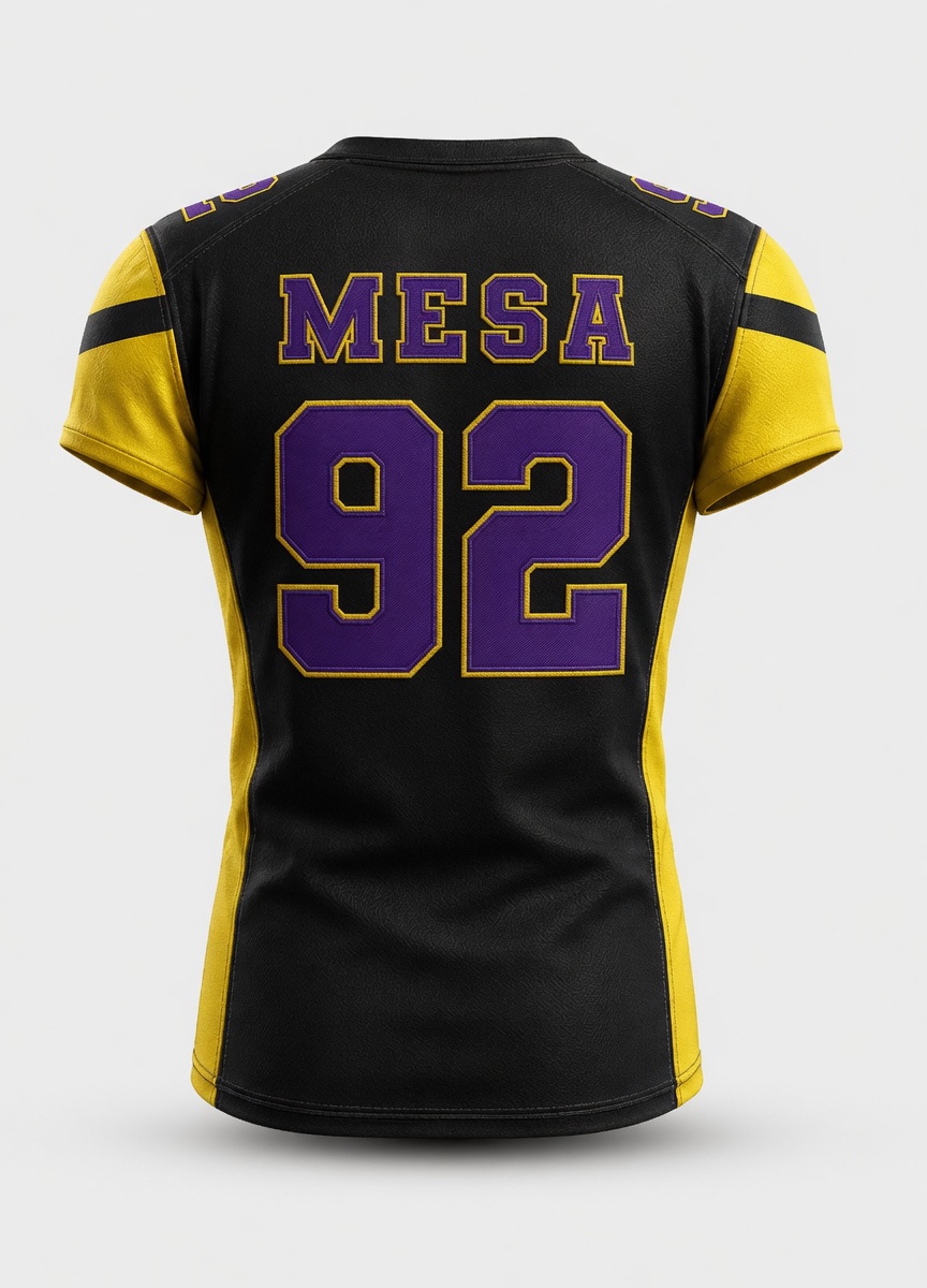 Back side of professional American football jersey featuring tackle twill lettering and polyester fabric for perfomance.